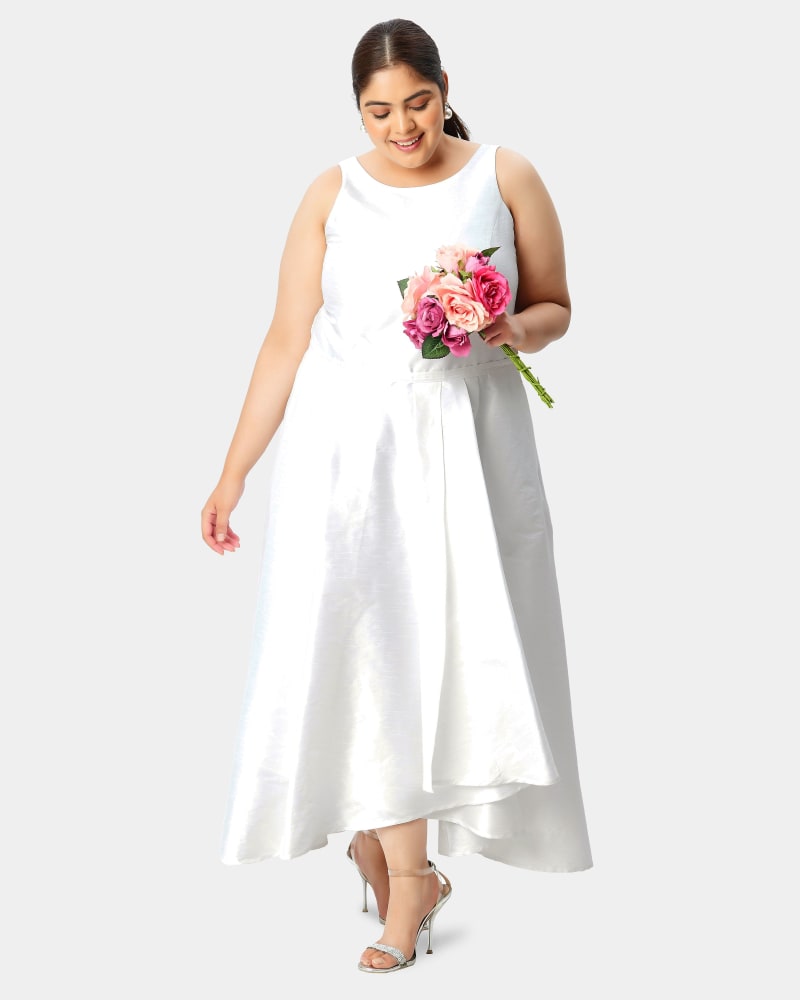 Front of a model wearing a size 5X-32W Asymmetric wrap skirted dupioni dress in White by eShakti. | dia_product_style_image_id:289633